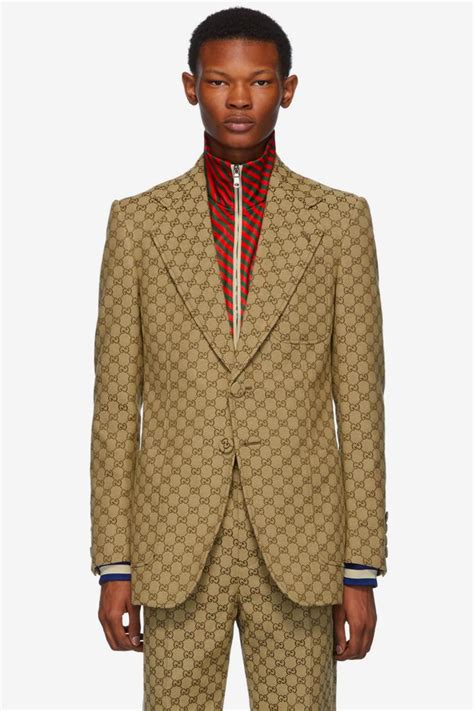 gucci suit logo|who makes gucci suits.